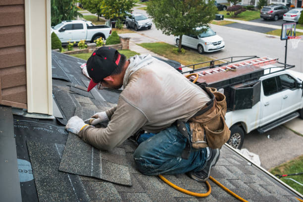 Professional Gutter Installation technician working in Cary, IL